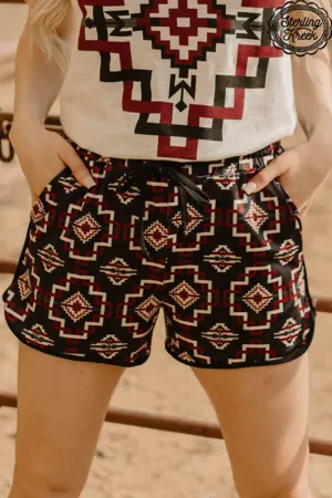 Red and black aztec raiderland shorts with drawstring and pockets