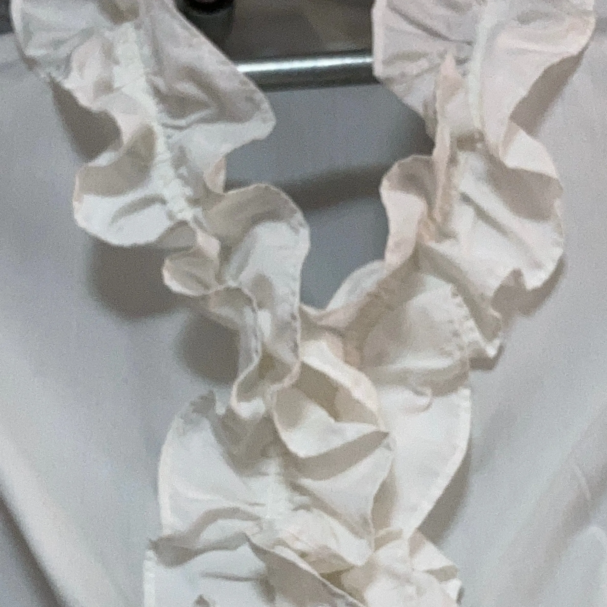 white frilled ruffle blouse